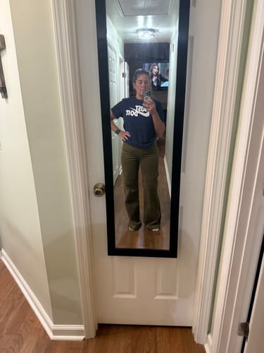 Customer's Judy Blue olive corduroy pants, worn in a front-facing mirror selfie.