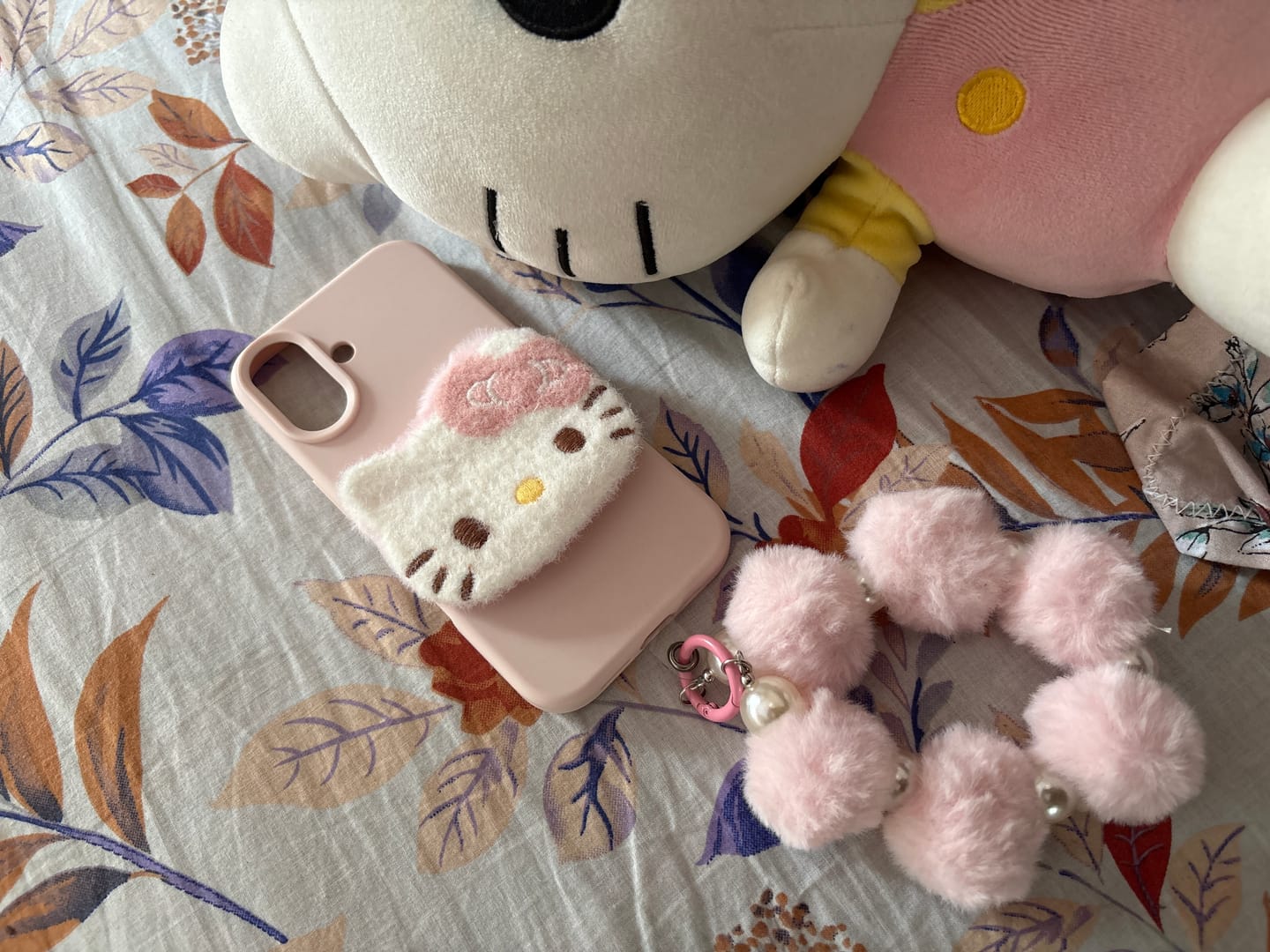 Customer photo review of 3D Hello Kitty Cartoon Pink Plush Fabric iPhone Case With Fur Pearl Lanyard