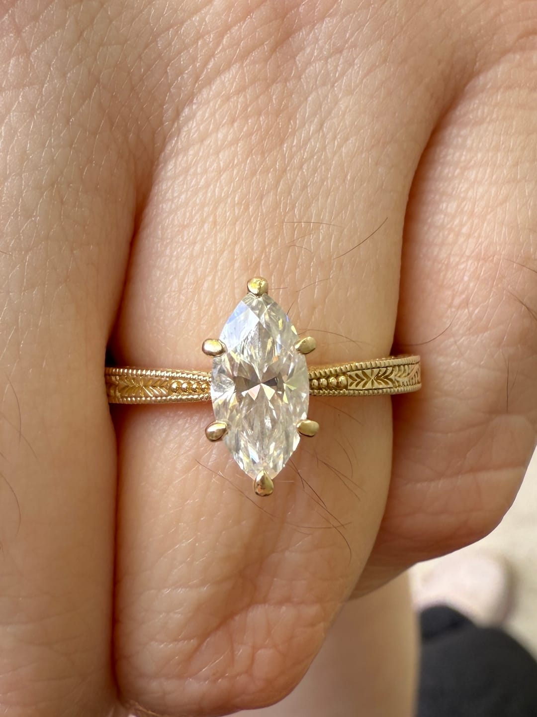 Customer photo review of Marquise solitaire carving moissanite engagement ring| DovEggs