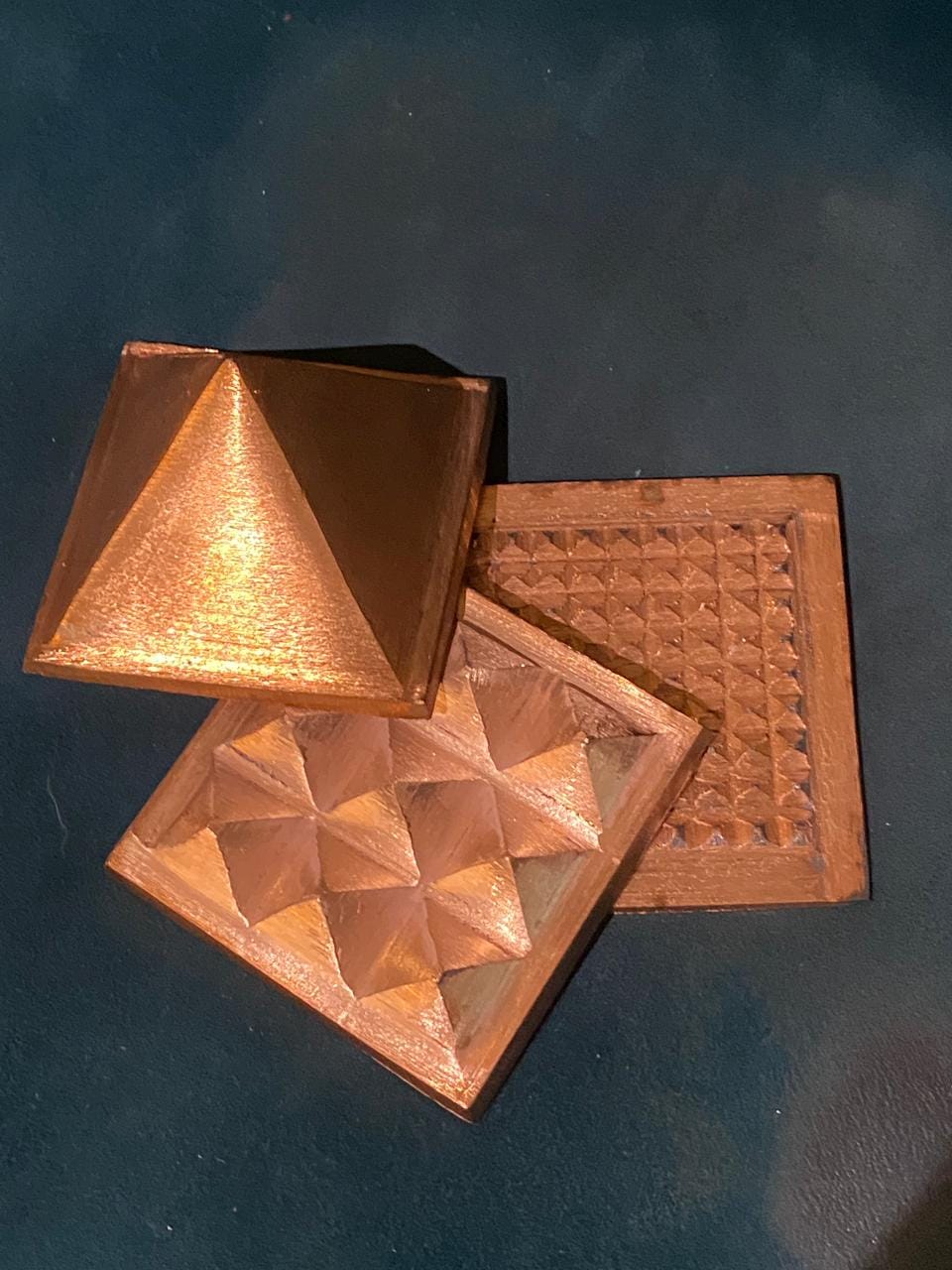 Customer photo review of 3-Layer Copper Pyramid Vastu Remedy for Energy Amplification, Prosperity and South East Direction Activation for Home, Office and Vastu Correction | 5-7.6 cm | 665 g