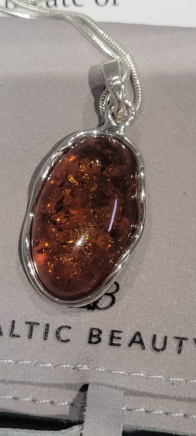 Customer photo review of Amber Ripple Pendant Necklace