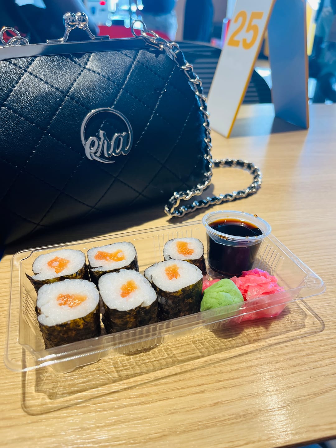 Customer photo review of ERA Mini Kisslock Chain Bag – Black