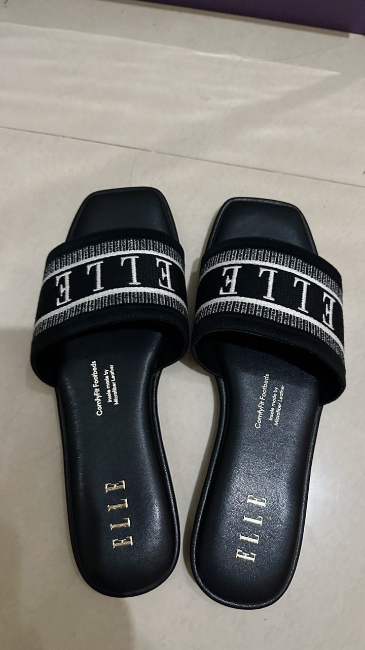 Customer photo review of Renee Logo Stitch Slip-on Sandals In Black