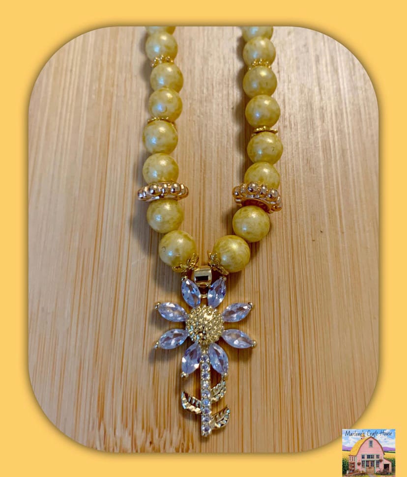 Customer photo review of 18K Gold-Plated Blooming Flower Pendant