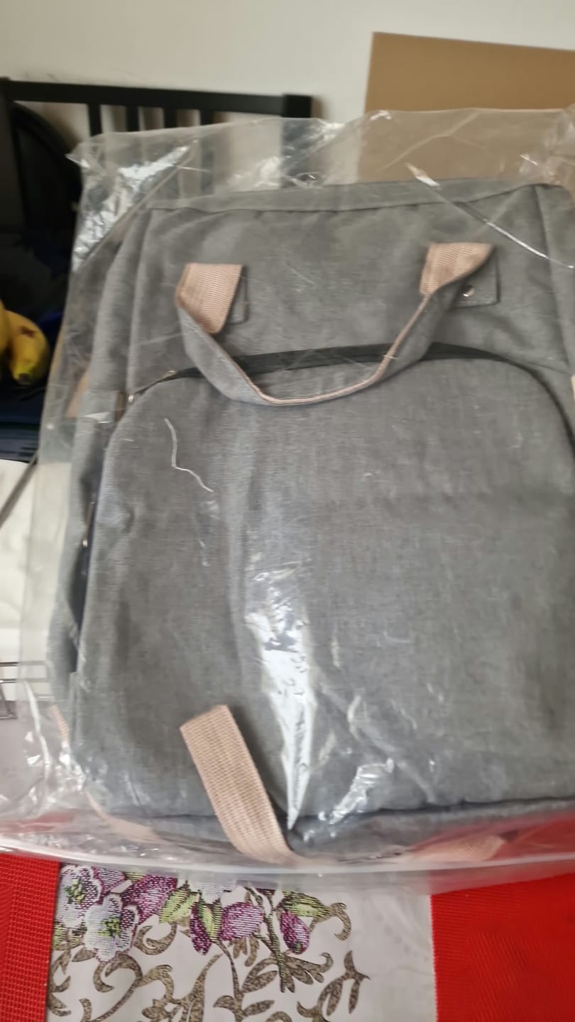 Customer photo review of Mochila Cambiador 6 en 1 para Bebé