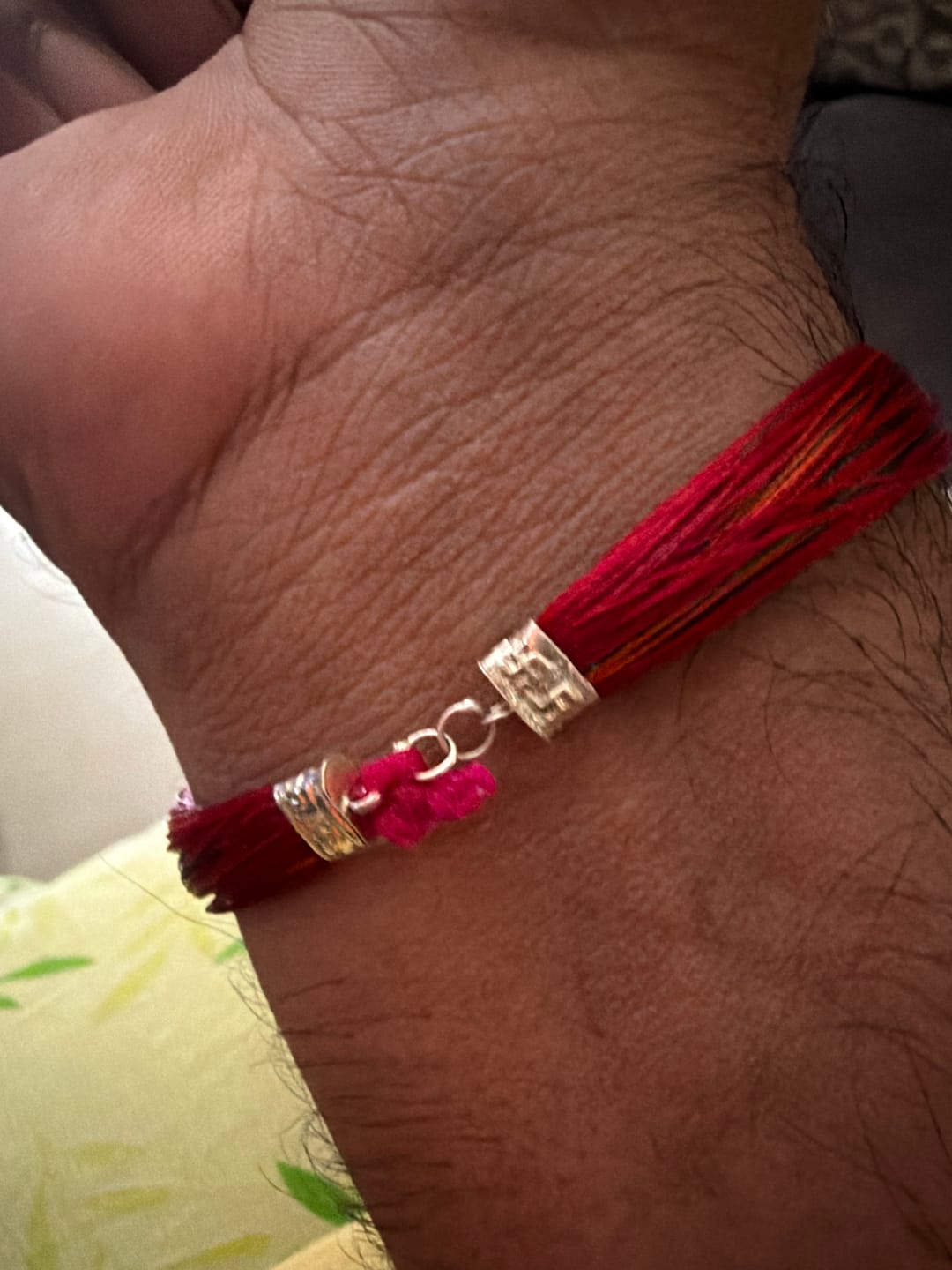 Customer photo review of Handcrafted Red & Black Sacred Thread Silver Bracelet