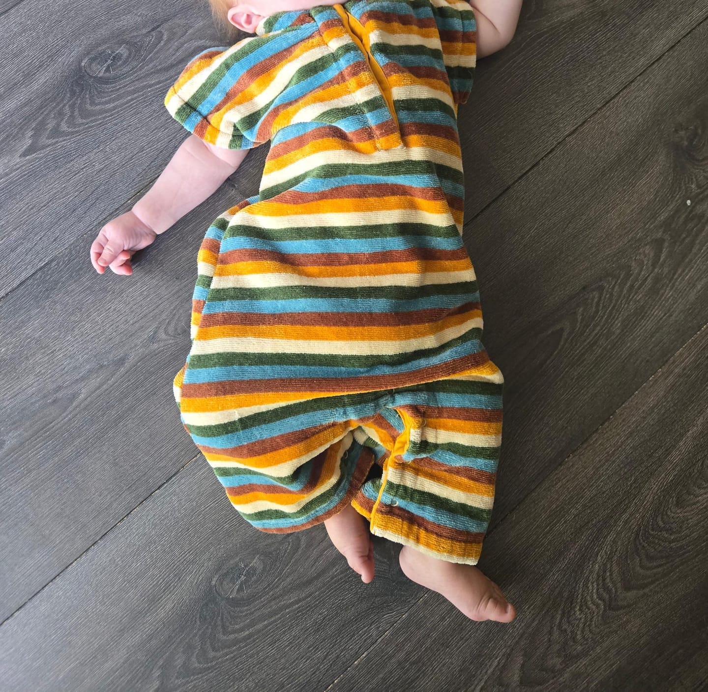 Customer photo review of Rainbow Striped Towelling Romper