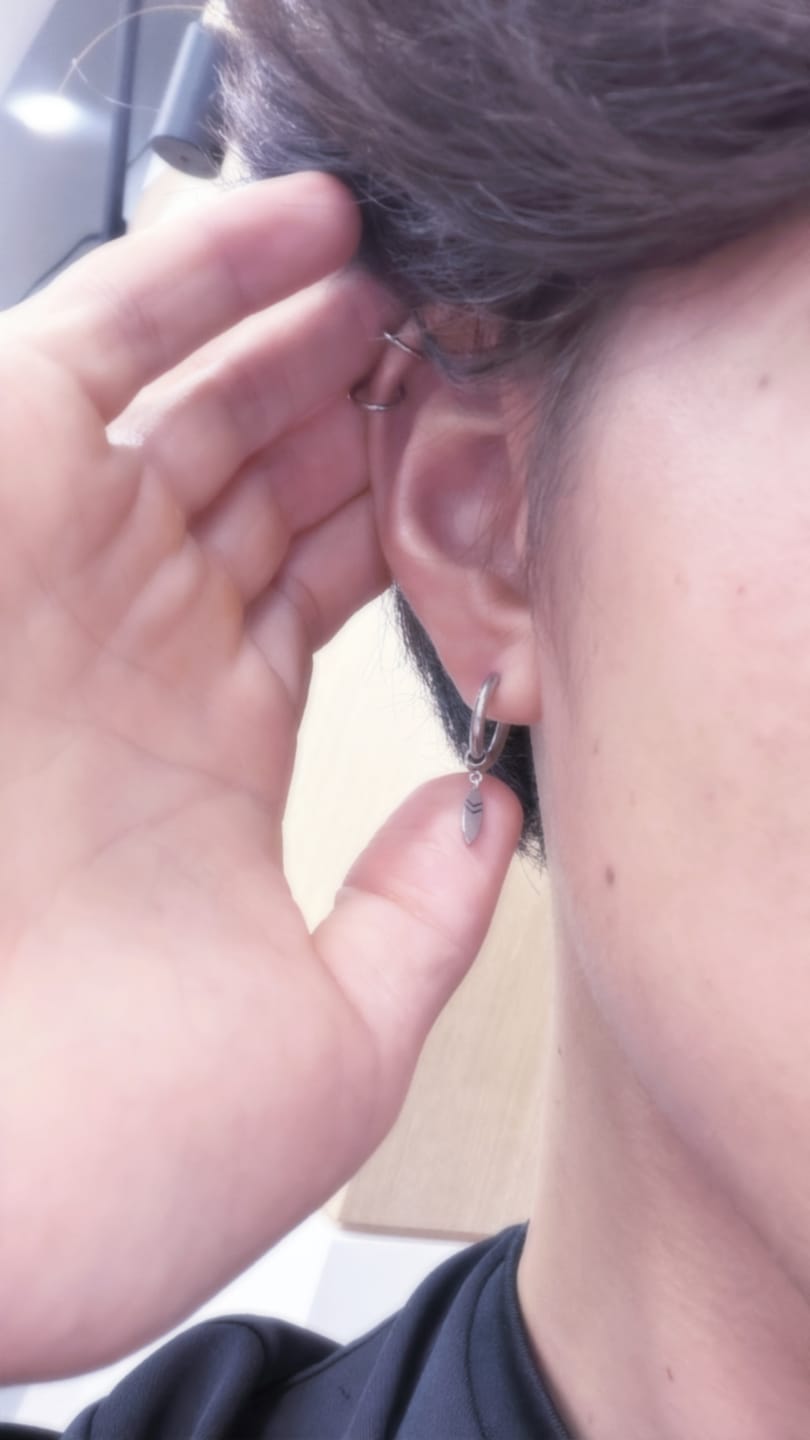 Customer photo review of Zuma Surf Hoop Earrings