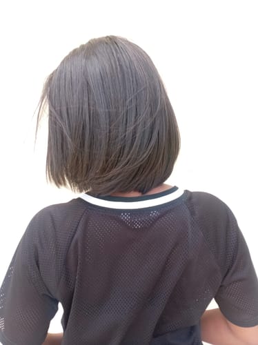 Customer photo review of Budget Vietnamese Super Double Drawn Bone Straight Hand Made 2x6 Closure 10" Natural Black Wig