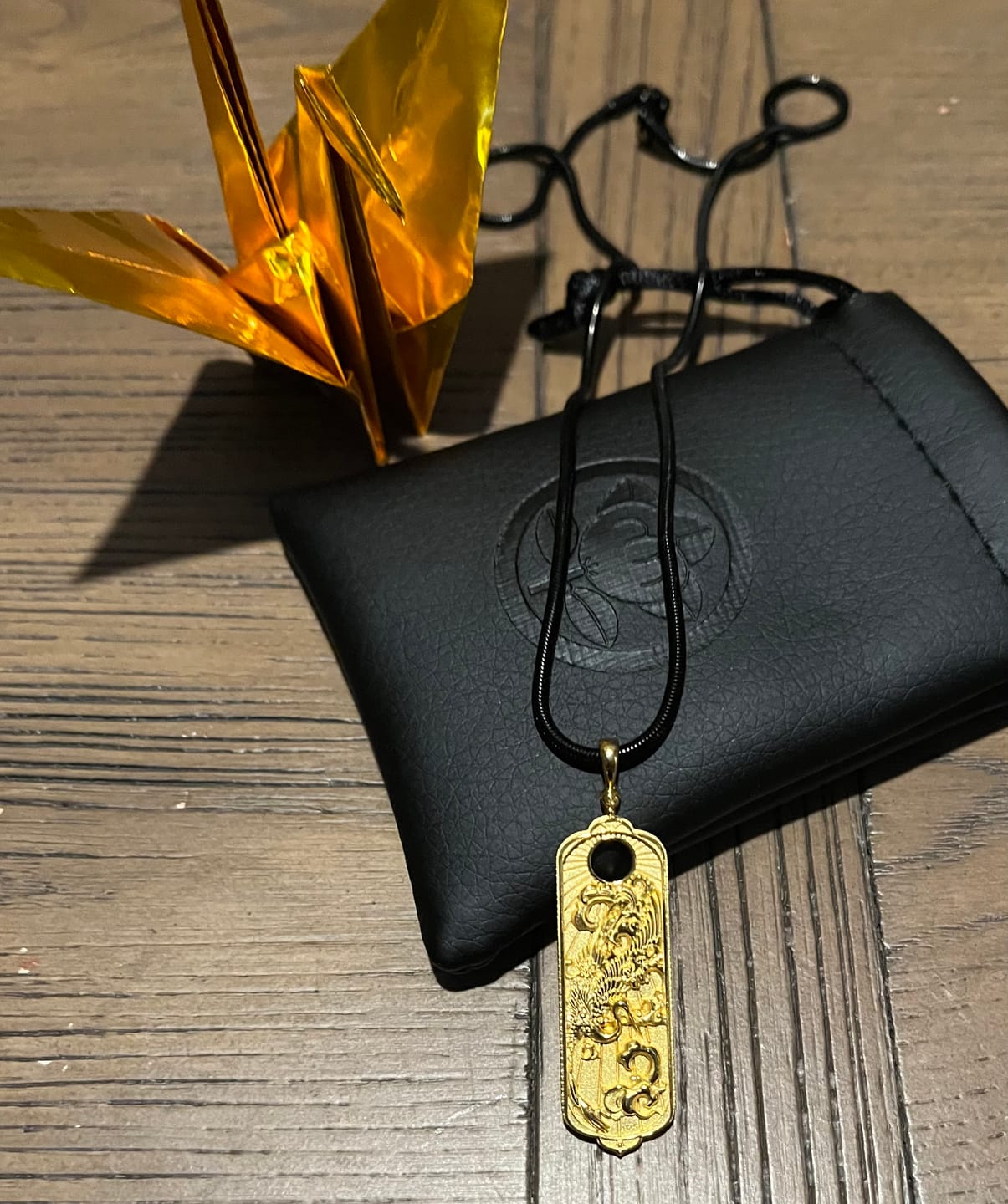 Customer photo review of Gold Turtle and Crane Amulet ( Limited edition )