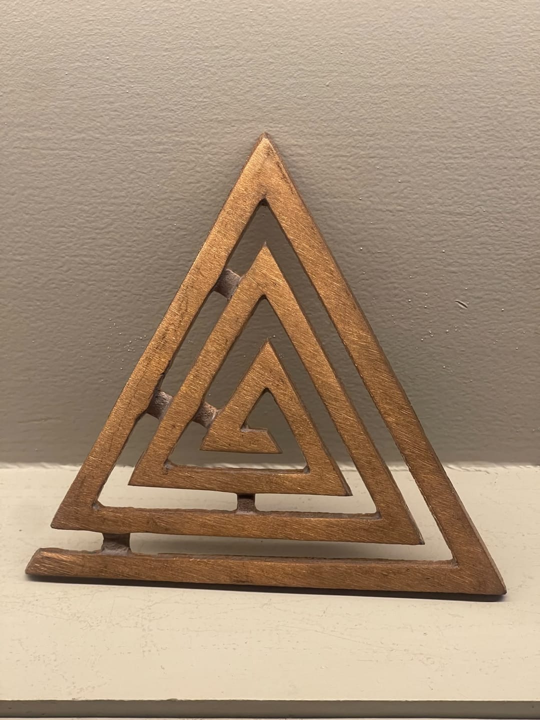 Customer photo review of Copper Triangle Helix – Vastu Remedy for South-East Direction Correction | Kitchen & Main Door Balance | 4 & 6 Inch