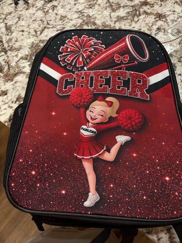 Customer's personalized Cheerleader Girl backpack in red and black, featuring a cheerleader graphic.