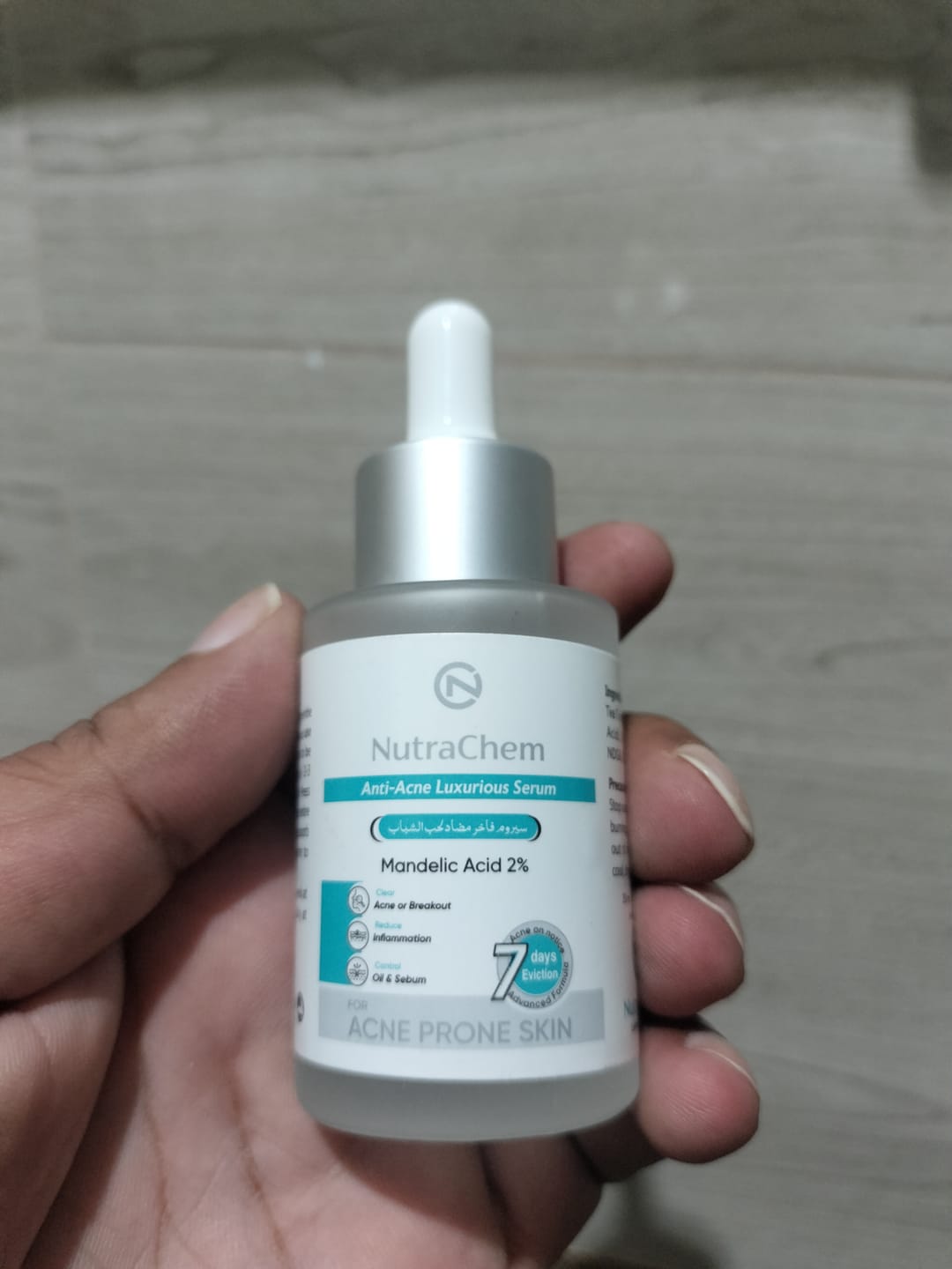 Customer photo review of Anti-Acne Serum with Mandelic Acid, Tea Tree Oil & Hyaluronic Acid for Clearer, Refined Skin