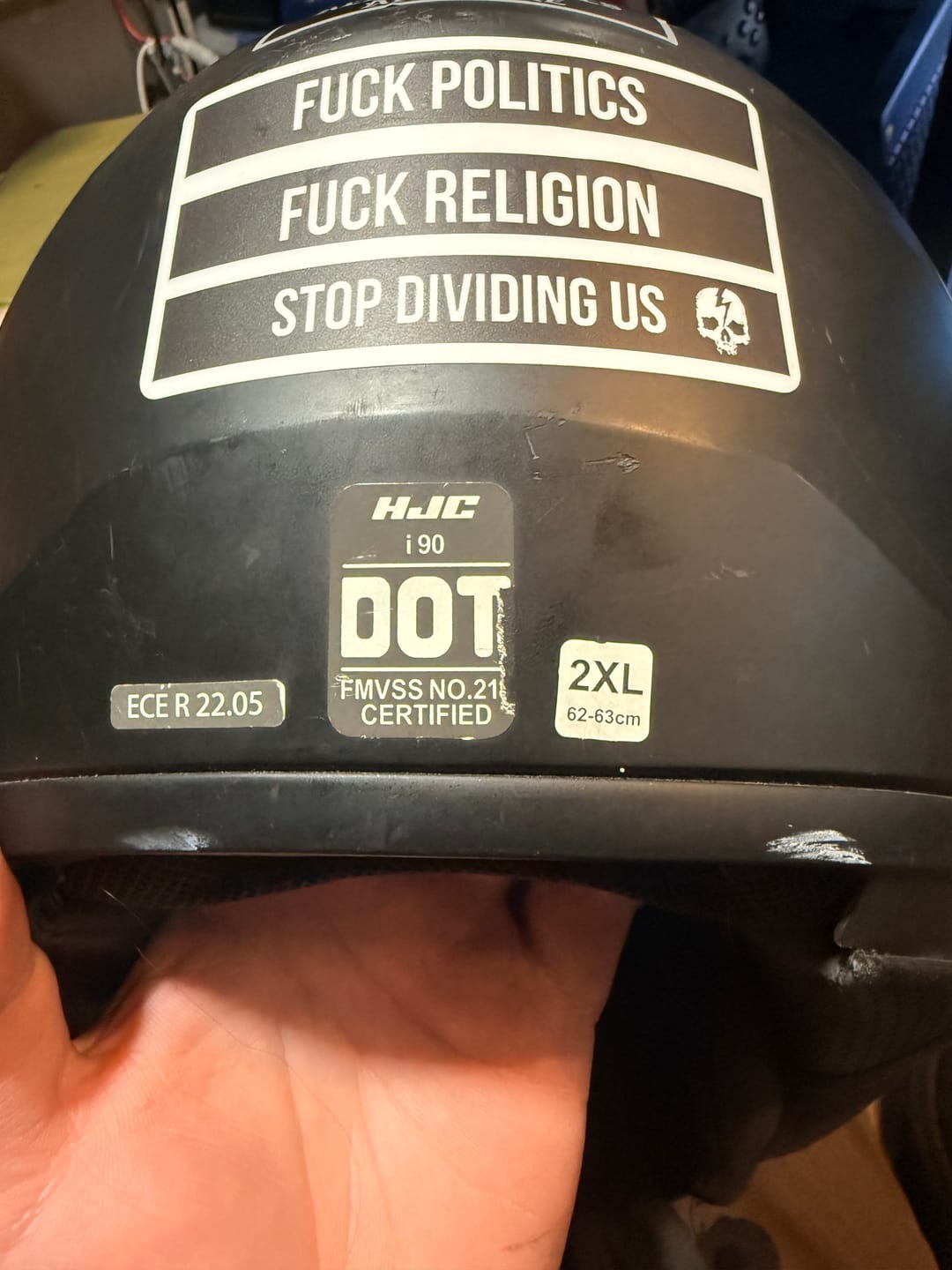 Customer photo review of STOP DIVIDING US STICKER