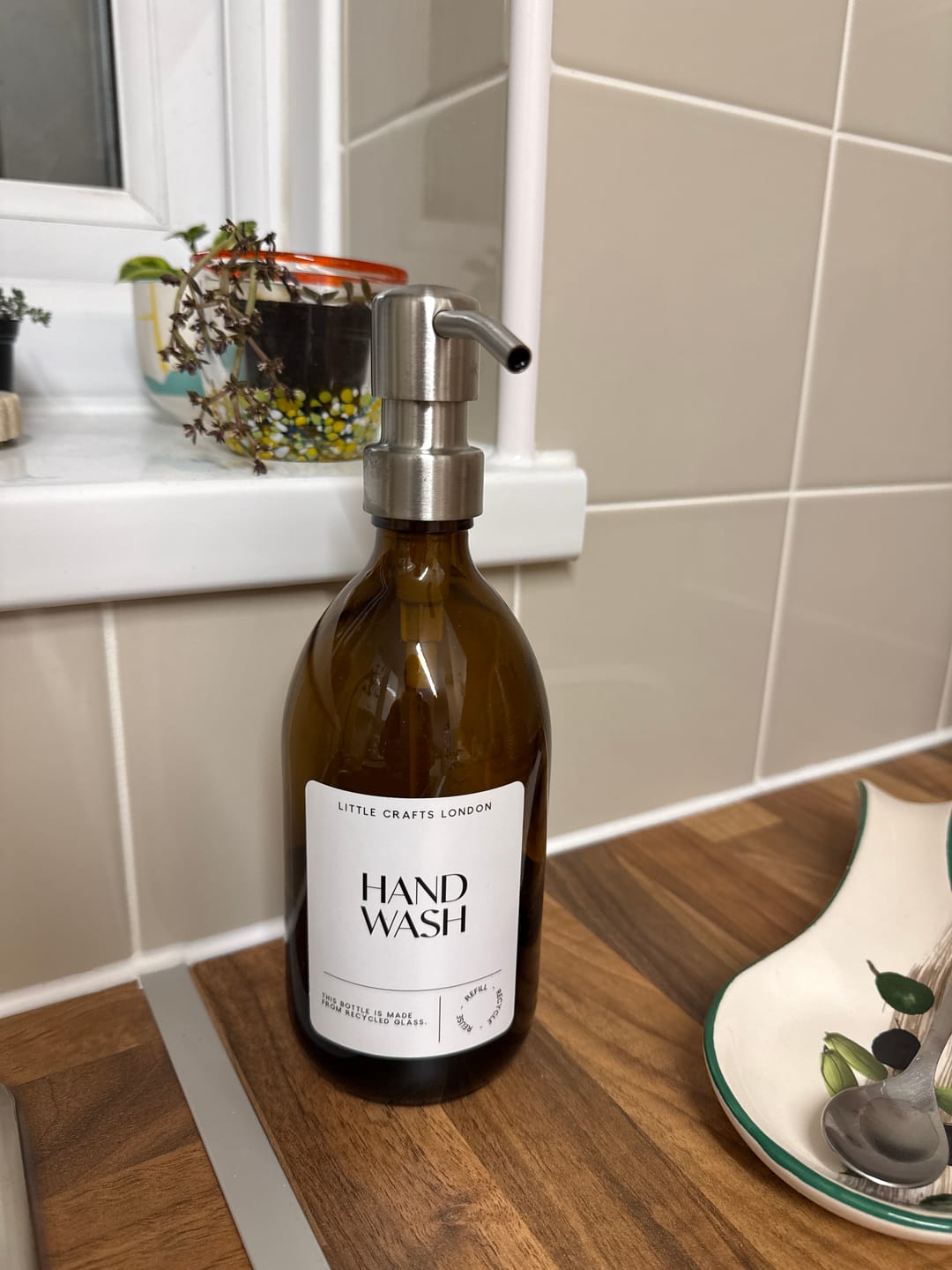 Customer photo review of 500ml Amber Glass Bottle with Metal Pump White Label
