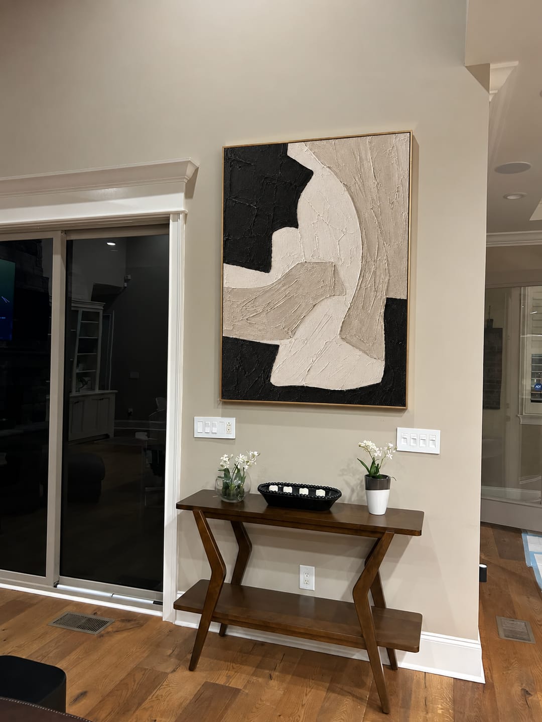Customer photo review of Sweeping Ivory Forms on Textured Black Wall Art