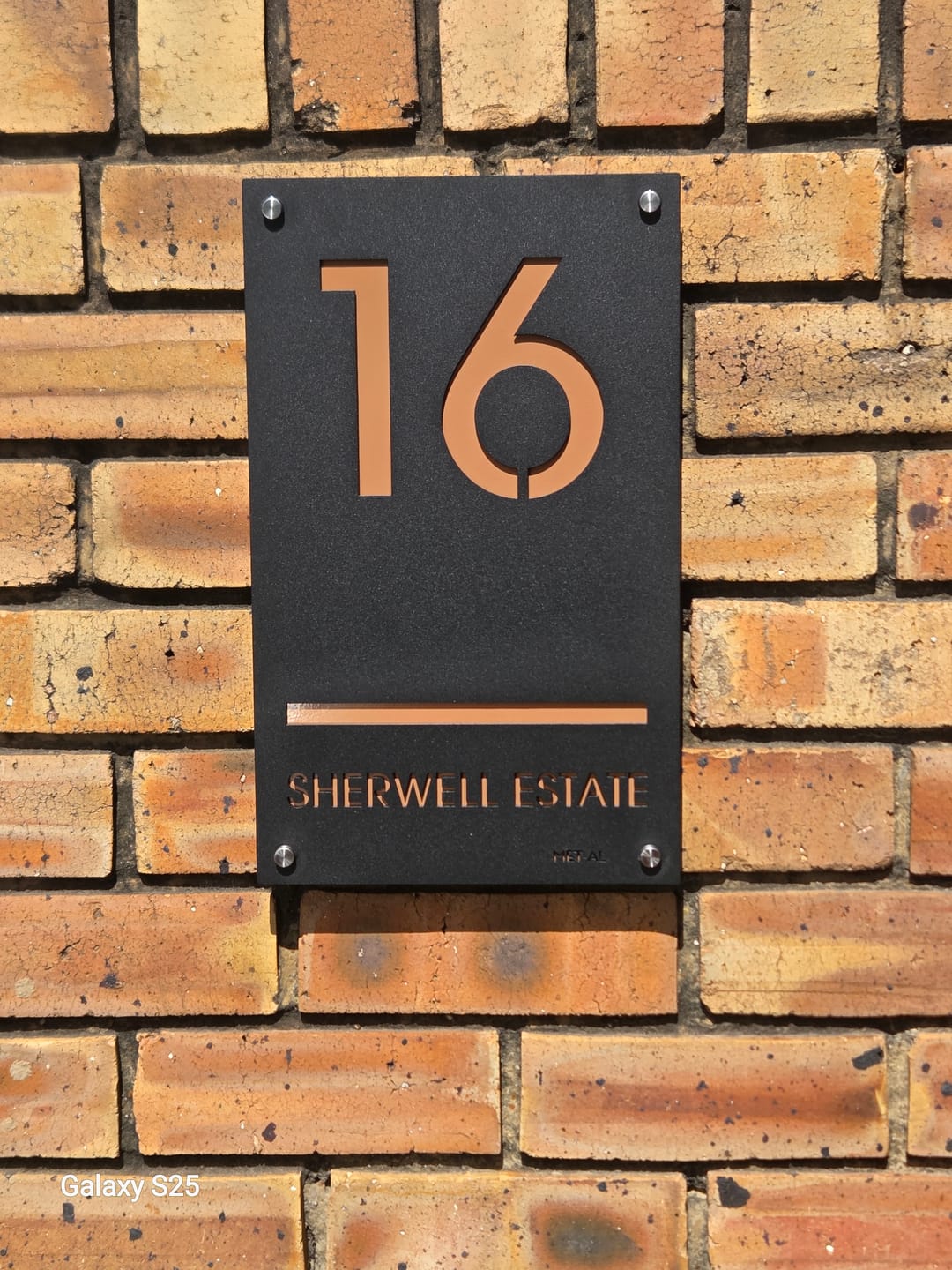 Customer photo review of The Monoline Metal House Number