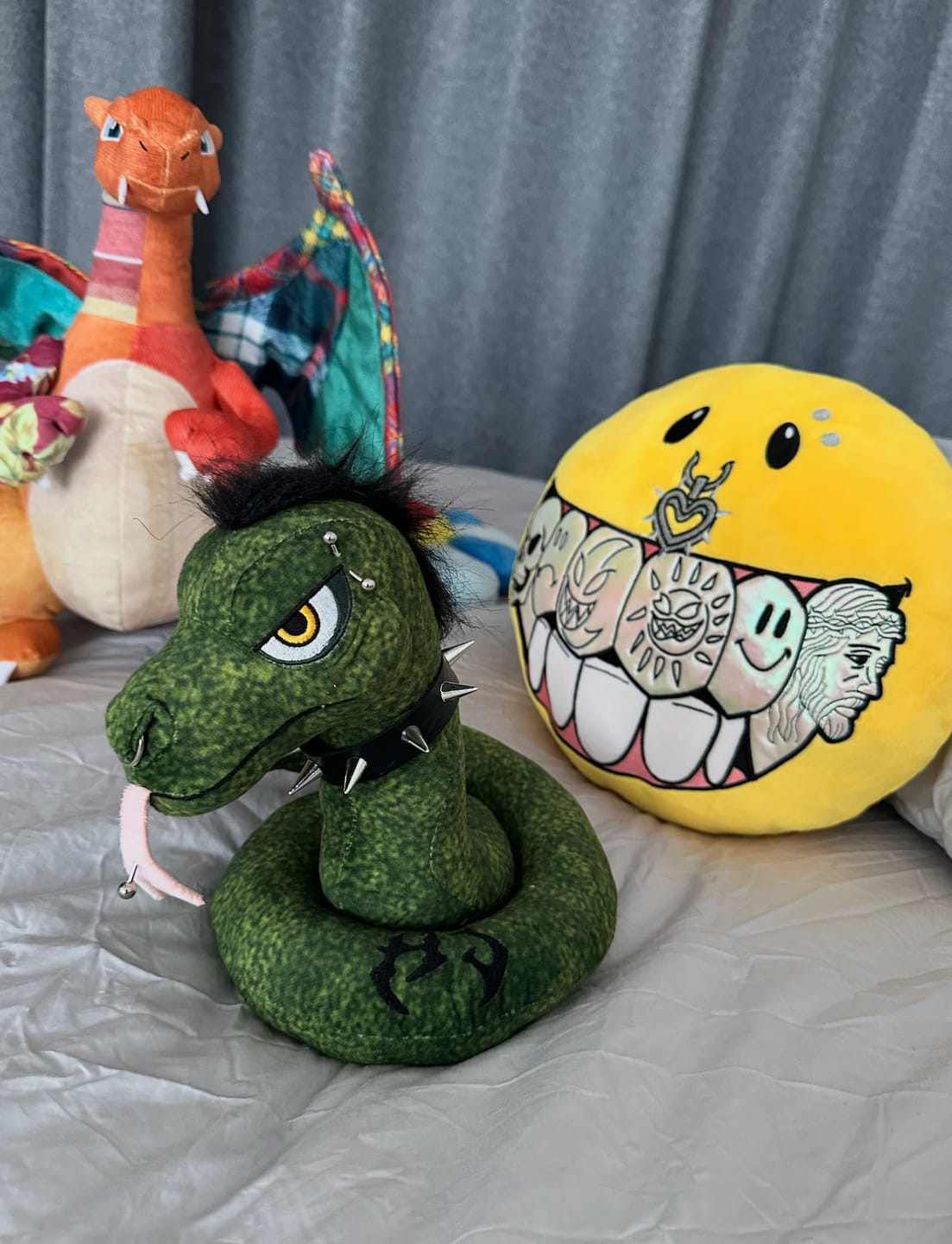Customer photo review of GUSHY, THE FLOODED SMILEY PLUSHIE