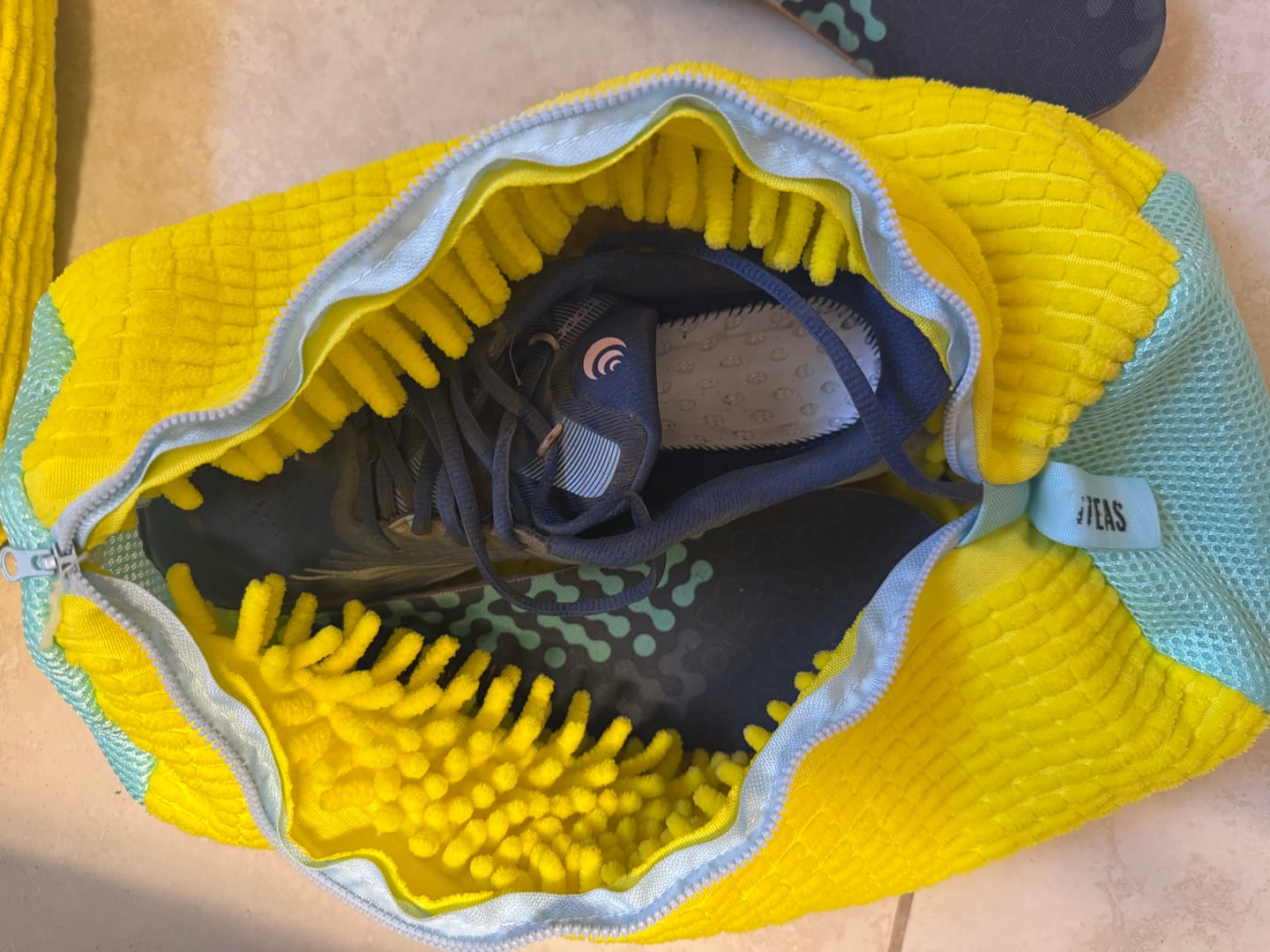 Customer photo review of FUNNELISH (White) Shoe Laundry Bag