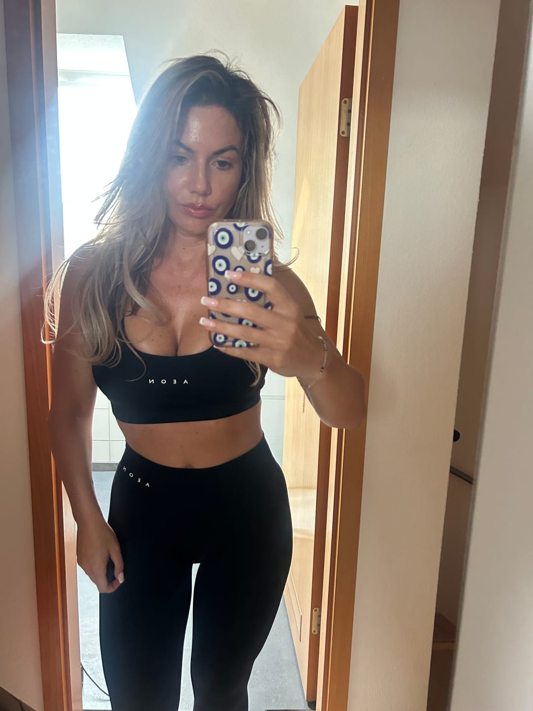 Customer photo review of MOTION BASE HIGH WAIST SCRUNCH LEGGINGS