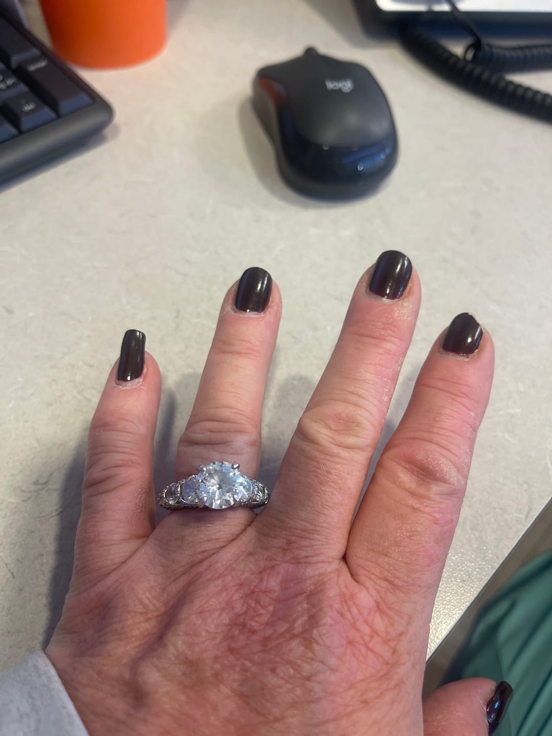 Customer photo review of Ultimate Luxury Round Cut 5.0ct Engagement Ring With Pavé Enhancer In Sterling Silver
