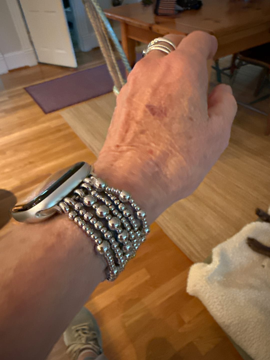 Customer photo review of Platinum Demure Stretch Apple Watch Strap