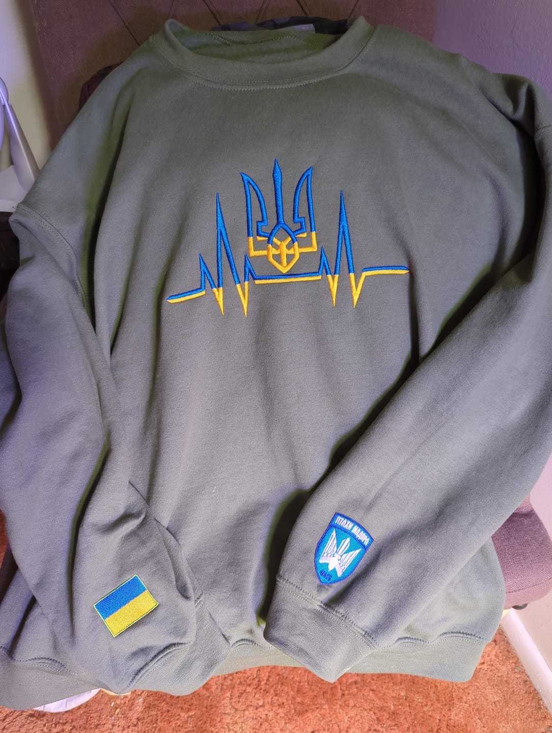 Customer photo review of Embroidered Heartbeat of Ukraine Sweatshirt