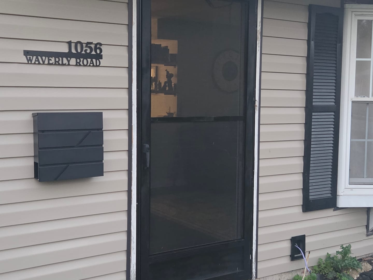 Customer photo review of Custom Modern Metal Address Sign – House Number and Street Name Wall Plaque