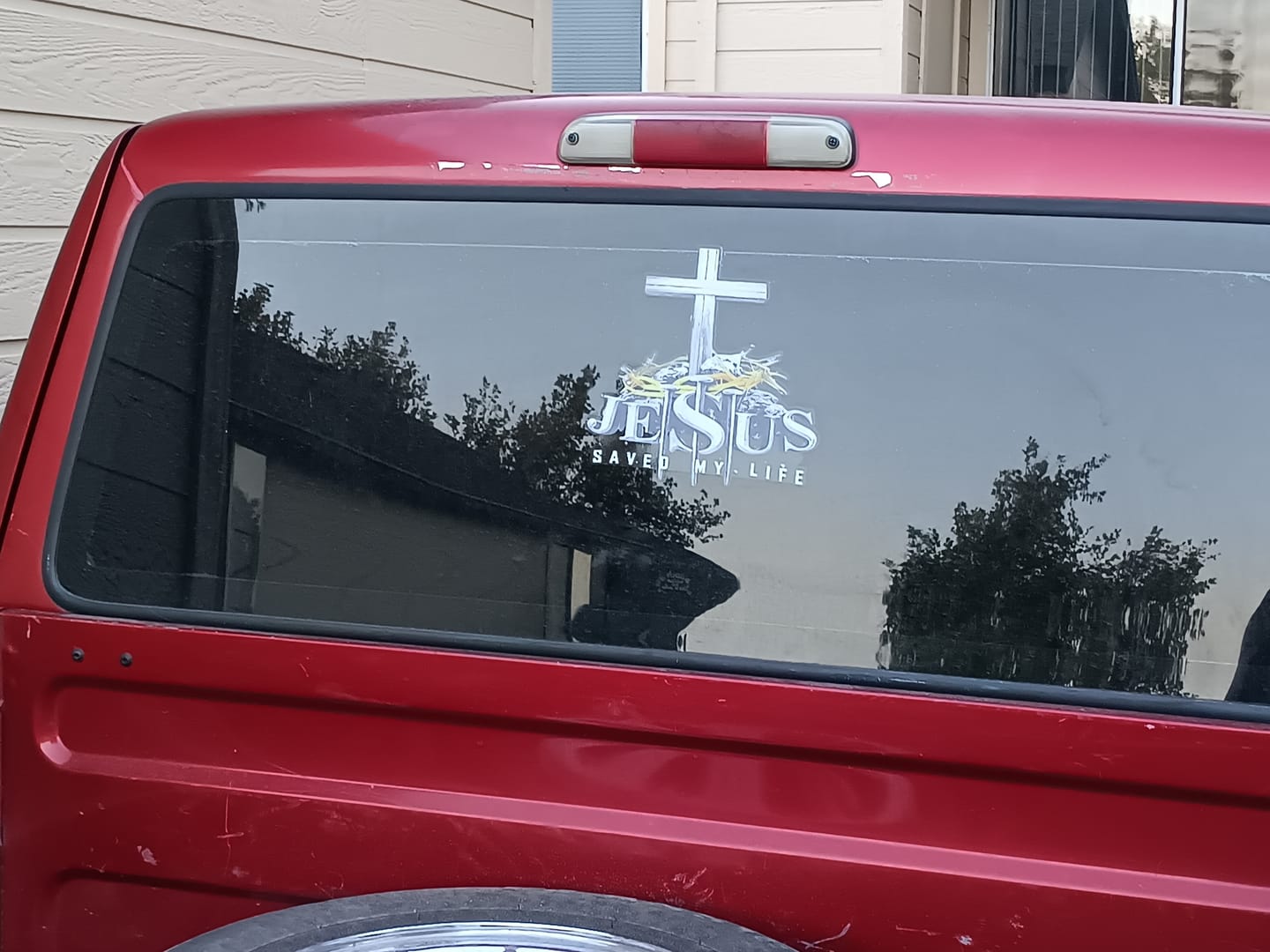 Customer photo review of Christianartworkshop Cross Crown of Thorns Nails JESUS SAVED MY LIFE Waterproof Car Sticker: A Symbol of Redemptive Sacrifice