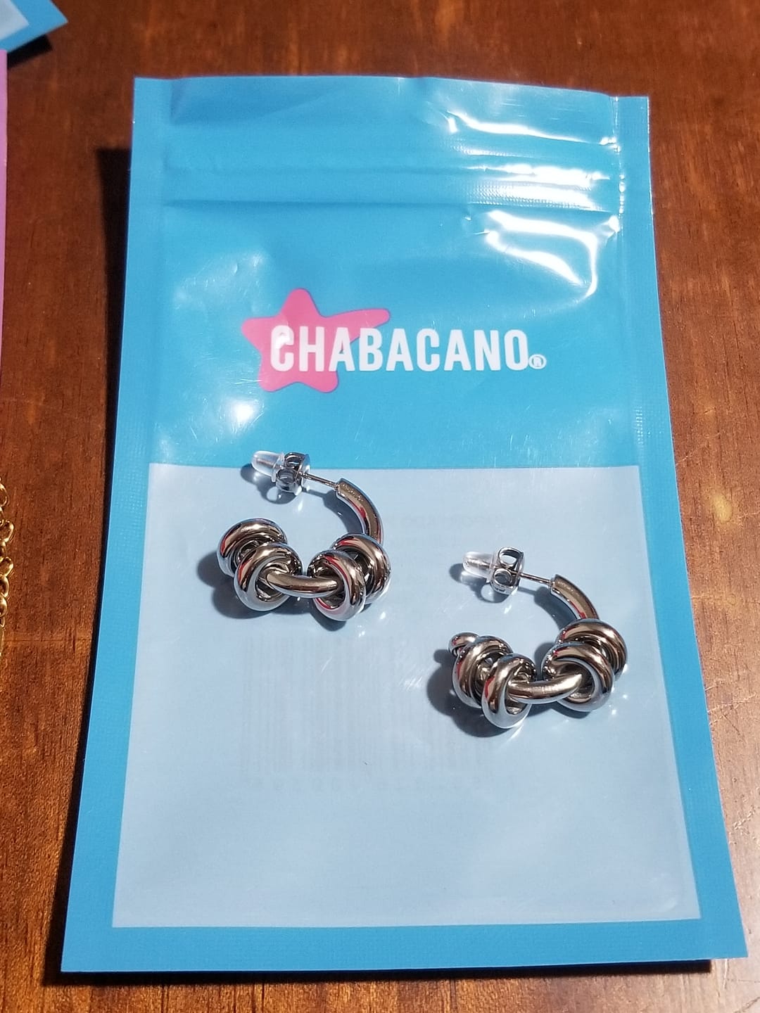 Customer photo review of Aretes Orbe Plata