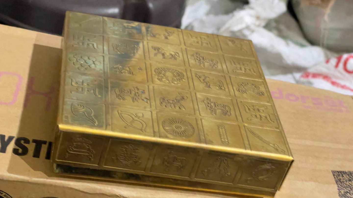 Customer photo review of Brass Manjusha Yantra Box with Partition – Vastu Remedy for Brahmasthan Correction | 16-Compartment Energy Organizer with 45 Devta Symbols | 5 & 9 Inch Sizes