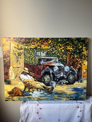Customer photo review of Homme se reposant près de sa Voiture