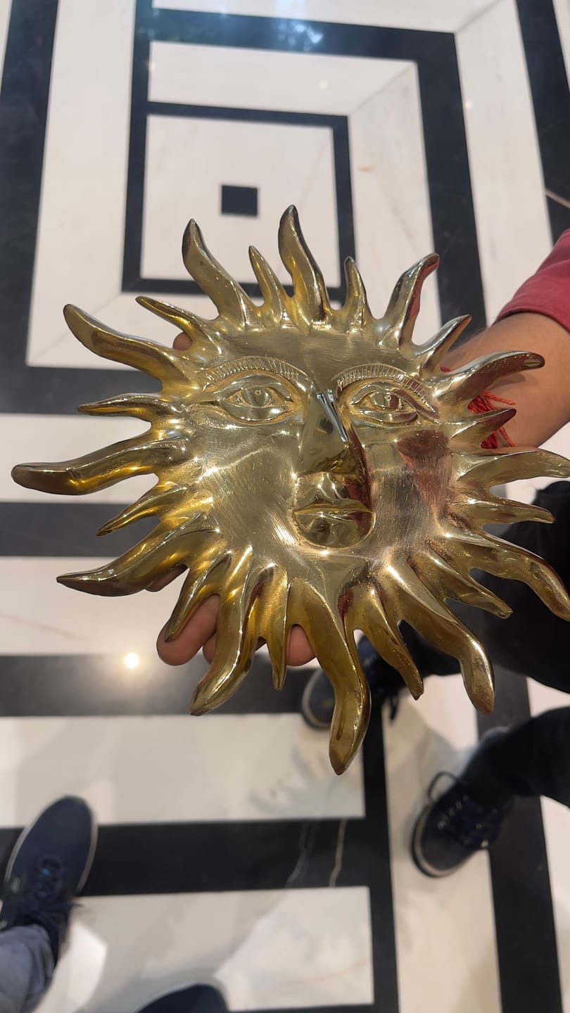 Customer photo review of Solid Brass Sun Face Wall Idol | Vastu Remedy for East Direction Prosperity & Fame | Main Door, Living Room & Office | 24 × 24 cm | 1 kg