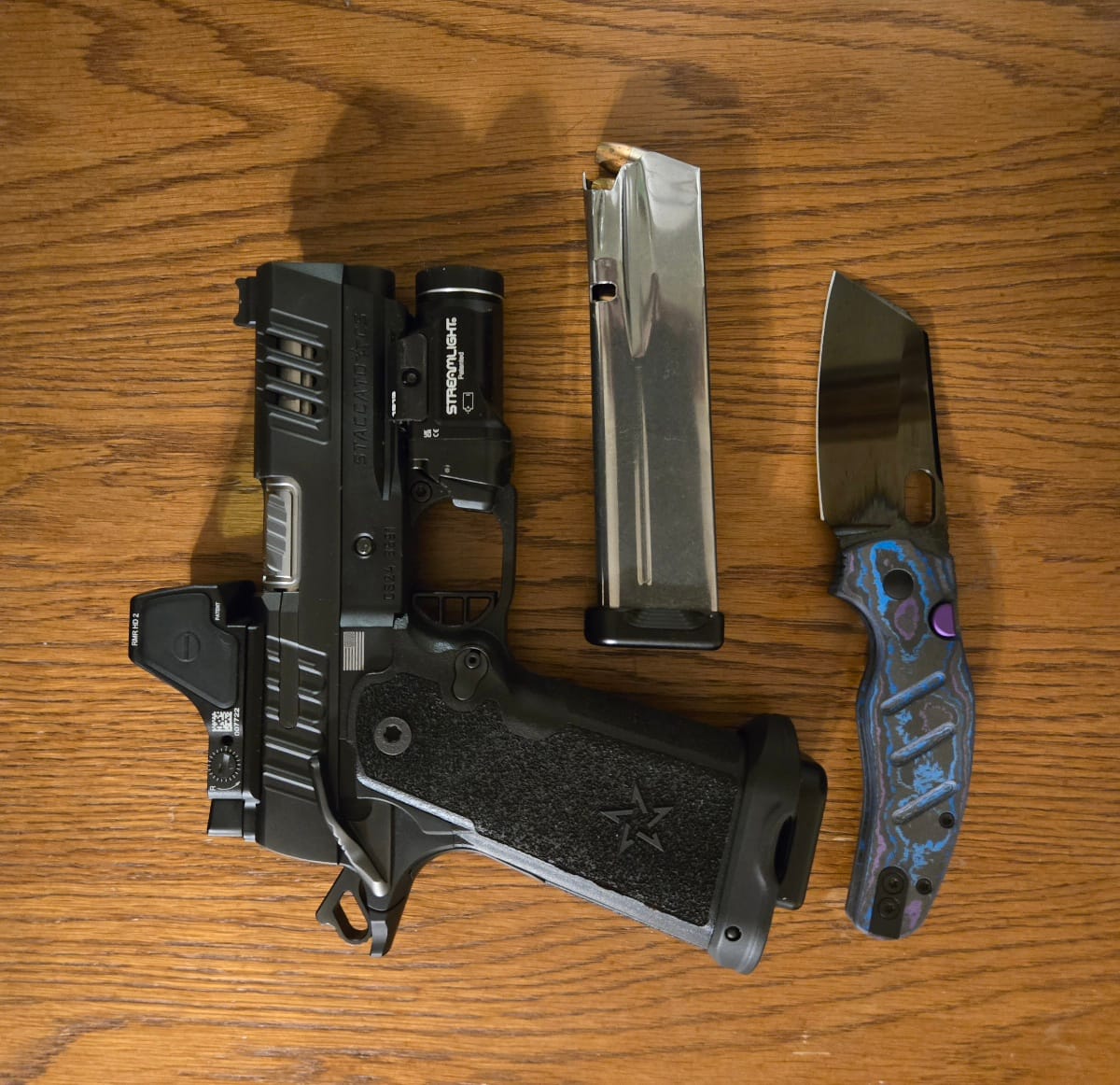 Customer photo review of Kizer Sheepdog Button Liner Lock Damtanium CamoCarbon Mirror DLC Elmax | Blade District Exclusive