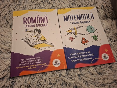 Customer's Pachet Evaluare Națională (Română + Matematică) books on textured surface.