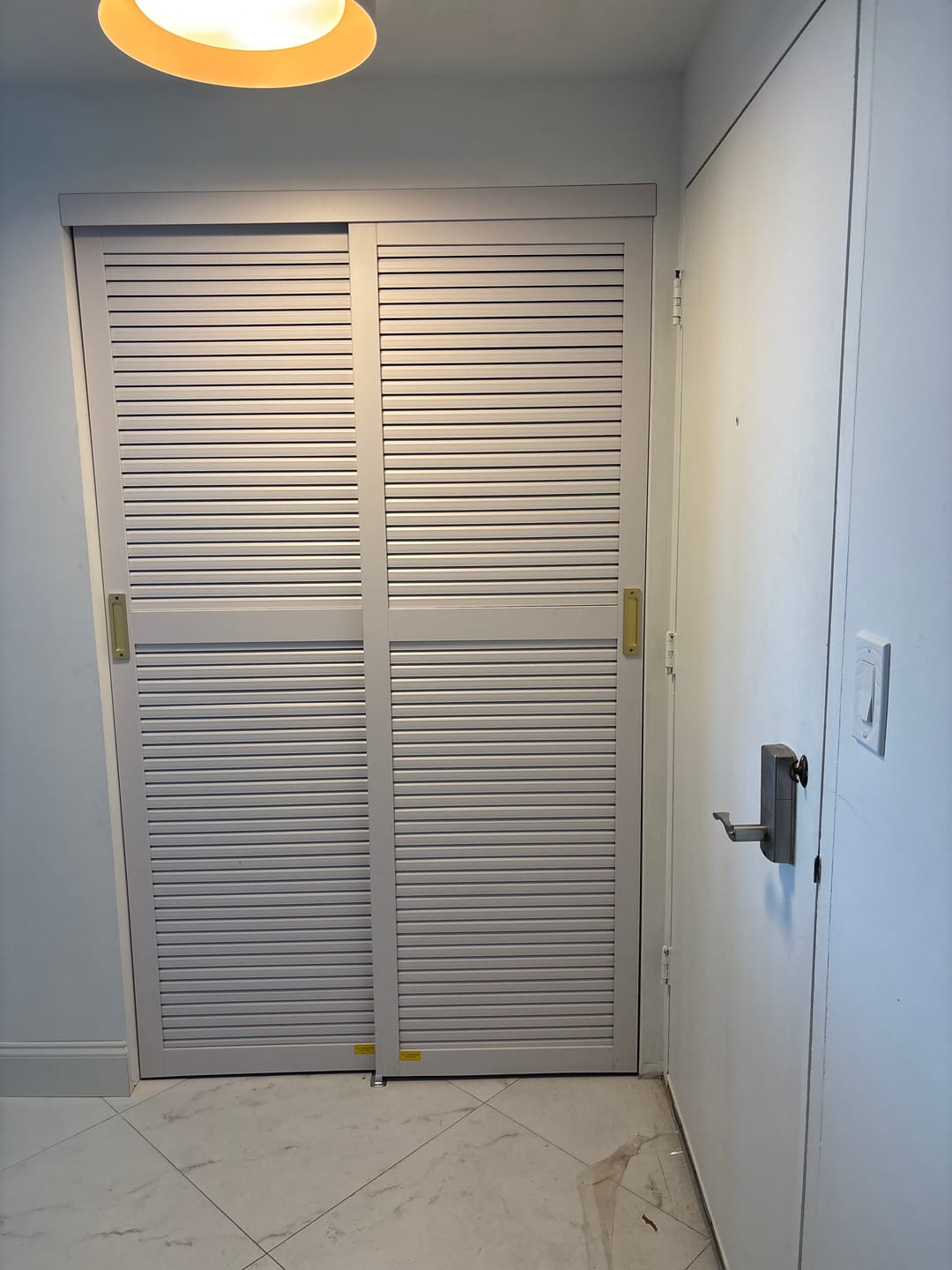 Customer photo review of TENONER White MDF Louvered Sliding Closet Door for Bedroom, Closet, and Livingroom - Space-Saving , Durable