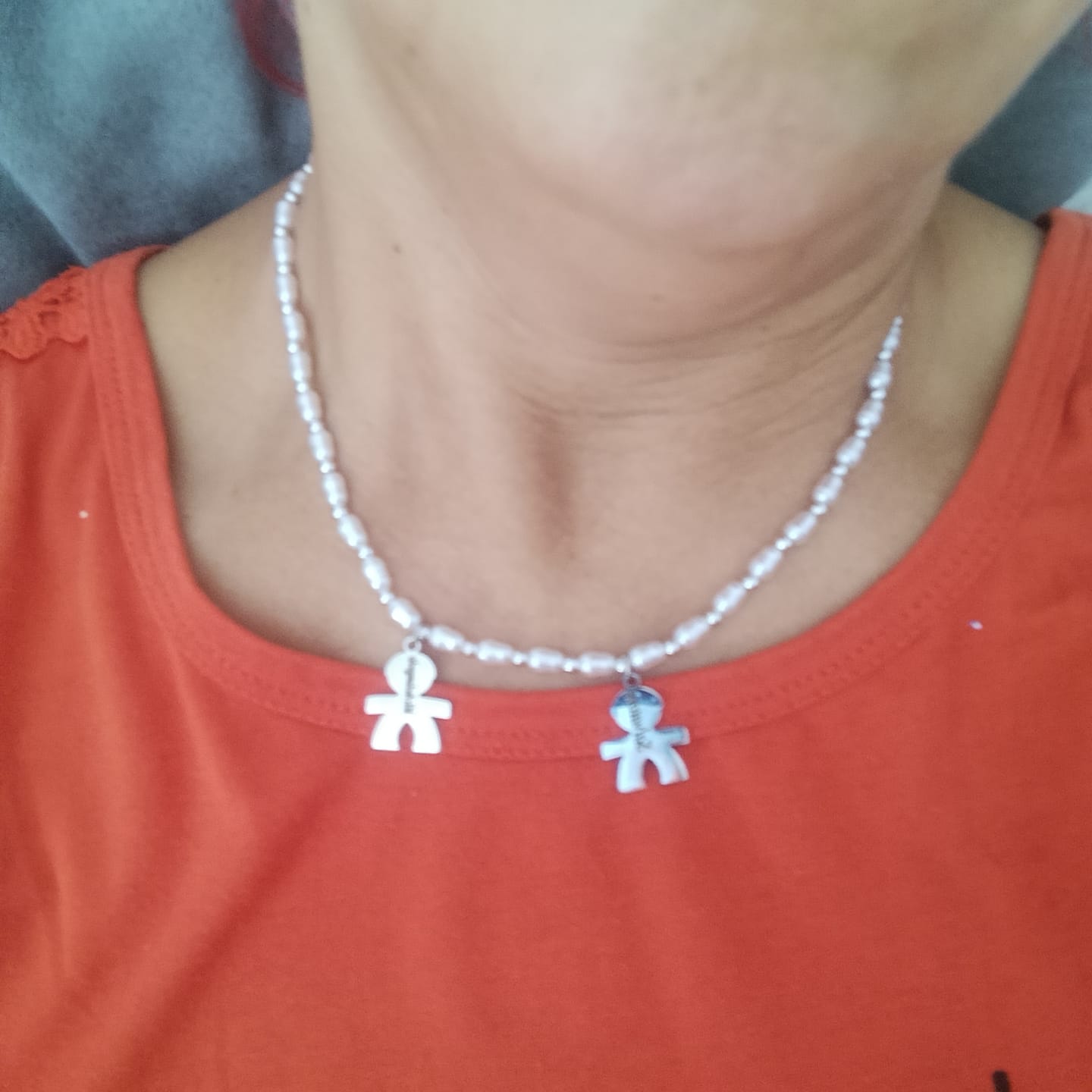 Customer photo review of Girocollo Family In Perle con ciondoli Bimbo Personalizzati