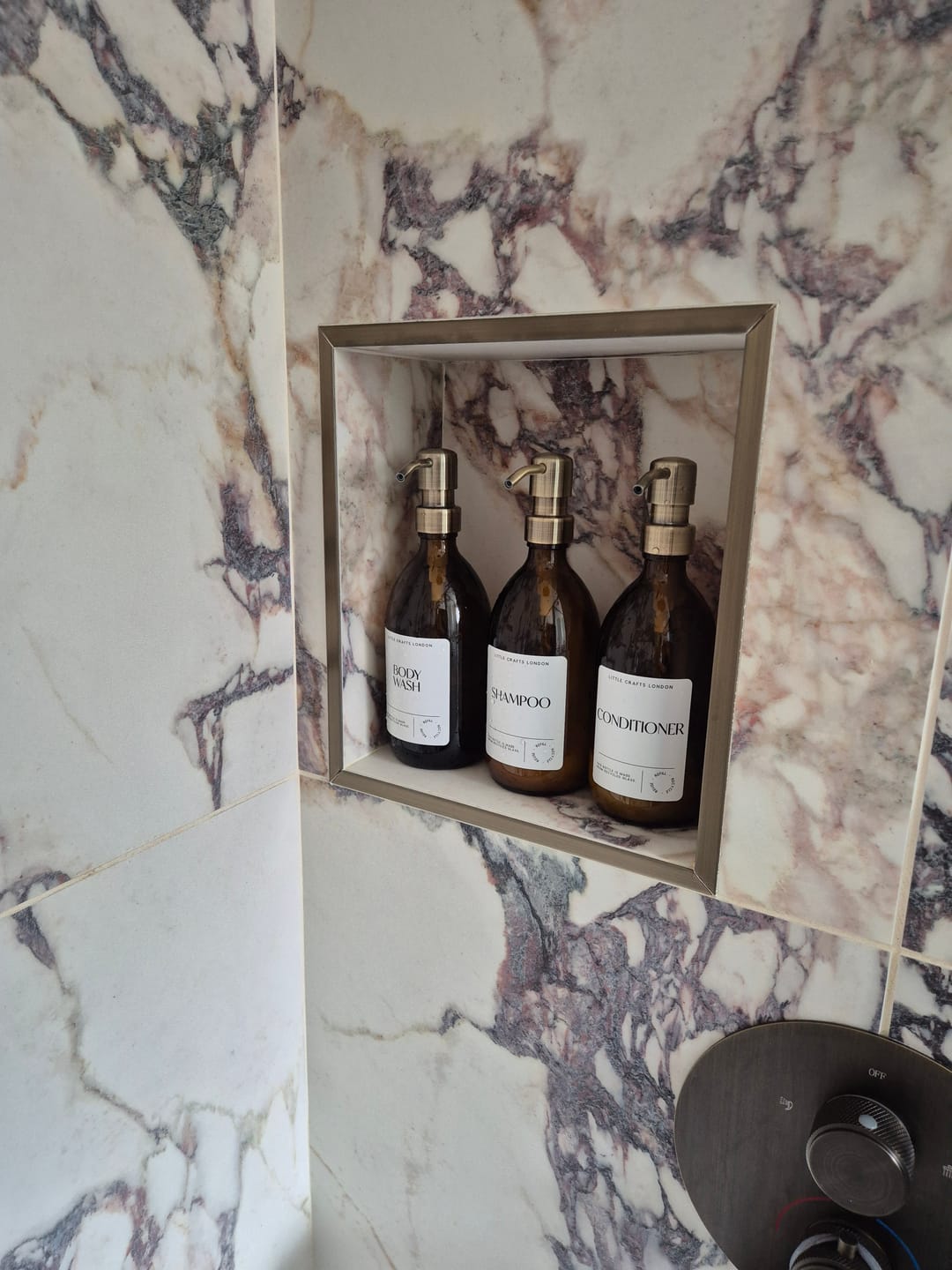 Customer photo review of 500ml Amber Glass Bottle with Metal Pump White Label