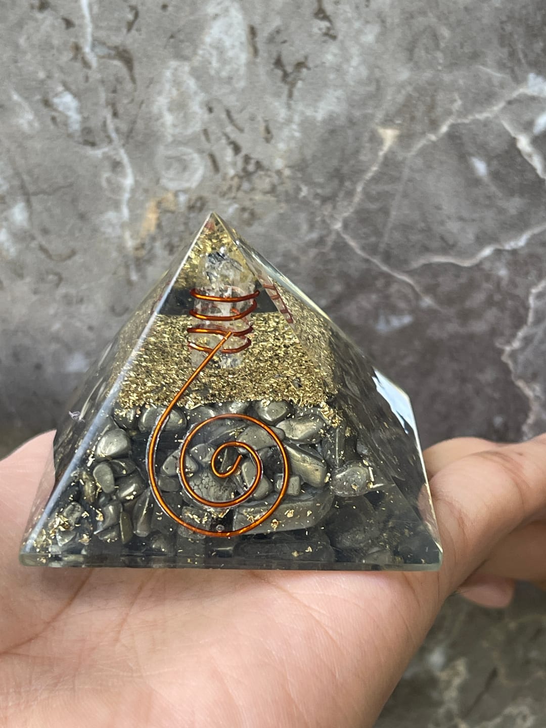 Customer photo review of Pyrite Copper Coil Orgone Pyramid Vastu Remedy for Wealth Magnetism, Money Protection and Prosperity Support for Home, Office and Business Spaces | 6.5 cm | 150 g