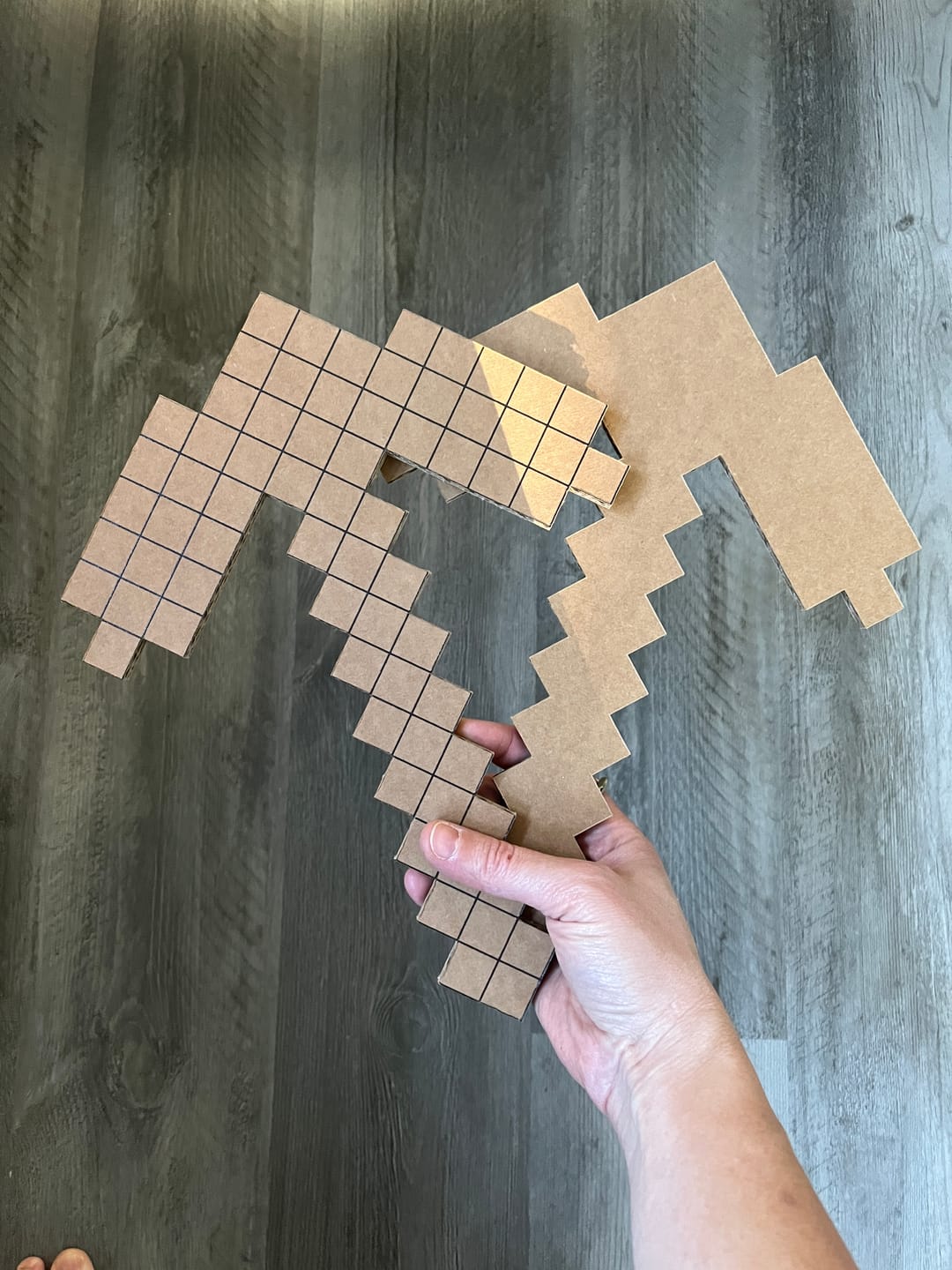 Customer photo review of DIY Minecraft Cardboard Swords and Axes for Kids – Birthday Party Craft, Recyclable Sword Decoration Activity