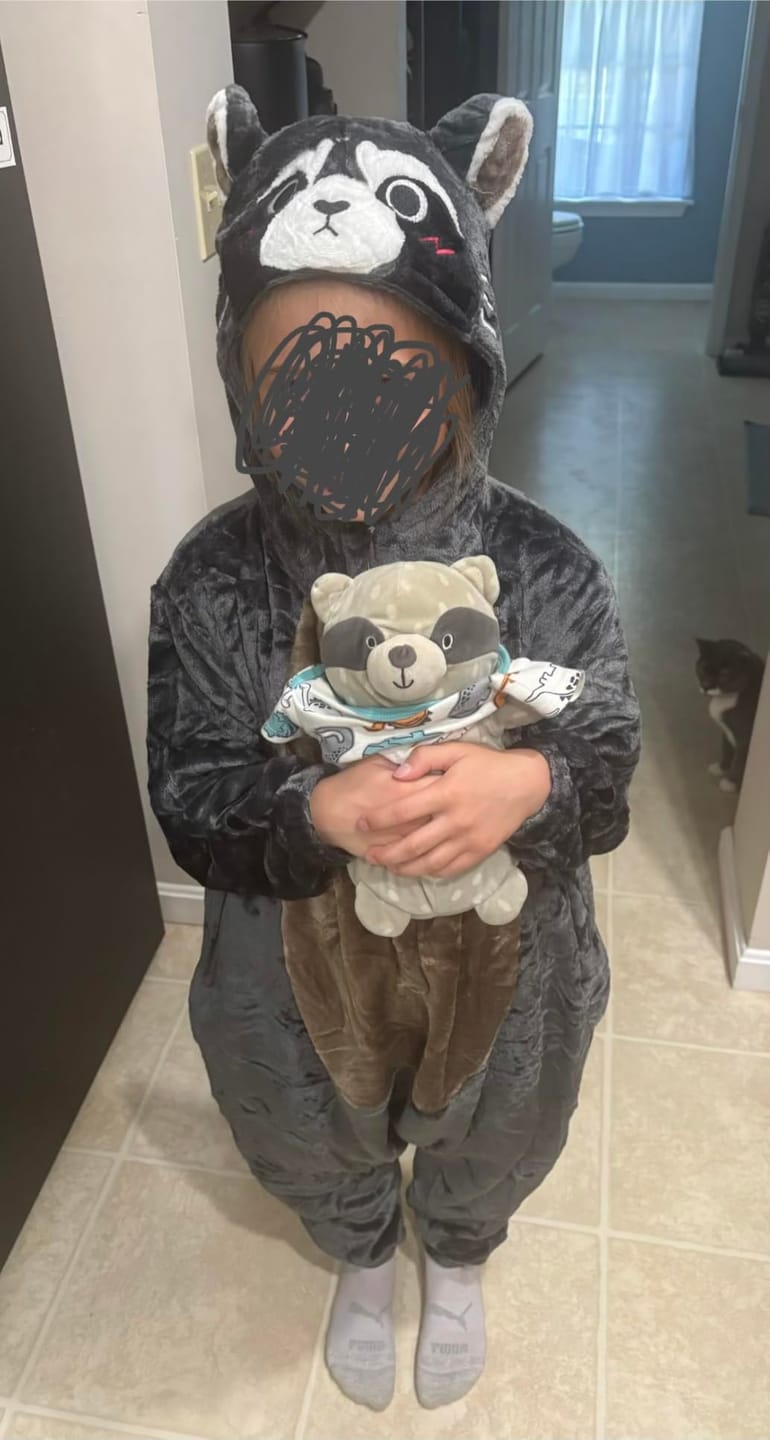 Customer photo review of OLAOLA Kids Raccoon Animal Onesie Plush Soft Flannel Warm Home Pajamas One-Piece Sleepwear