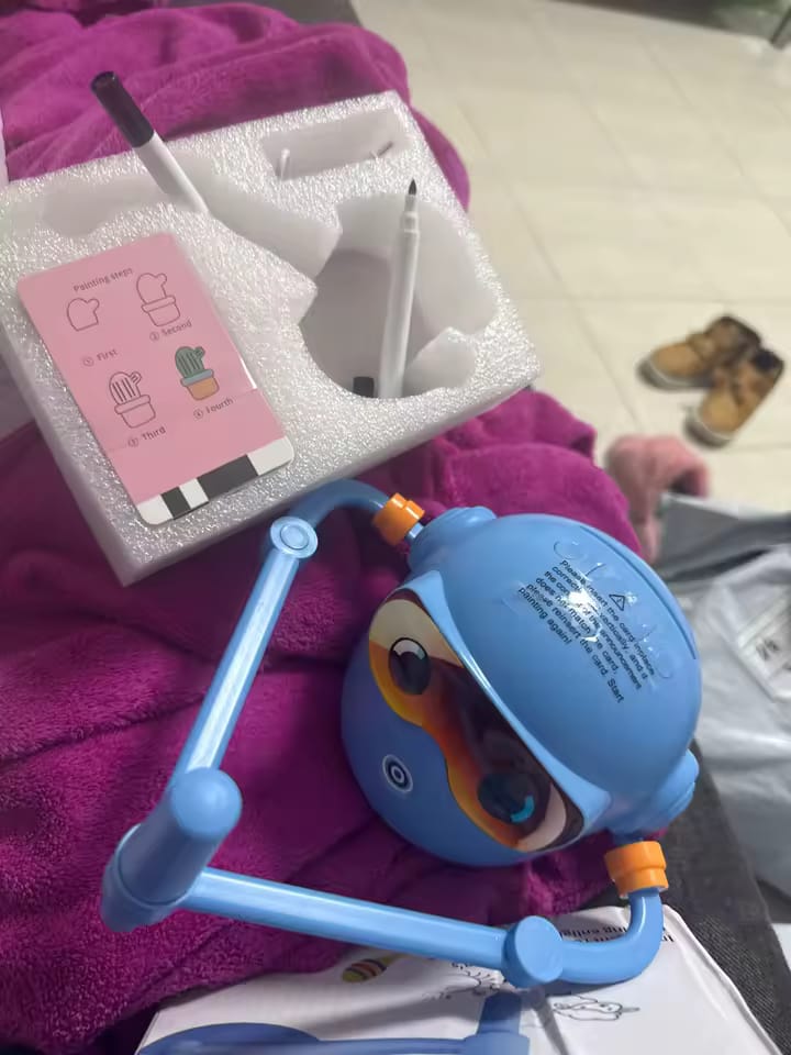 Customer photo review of Scribble Buddy: The Voice-Guided Drawing Robot for Little Artists