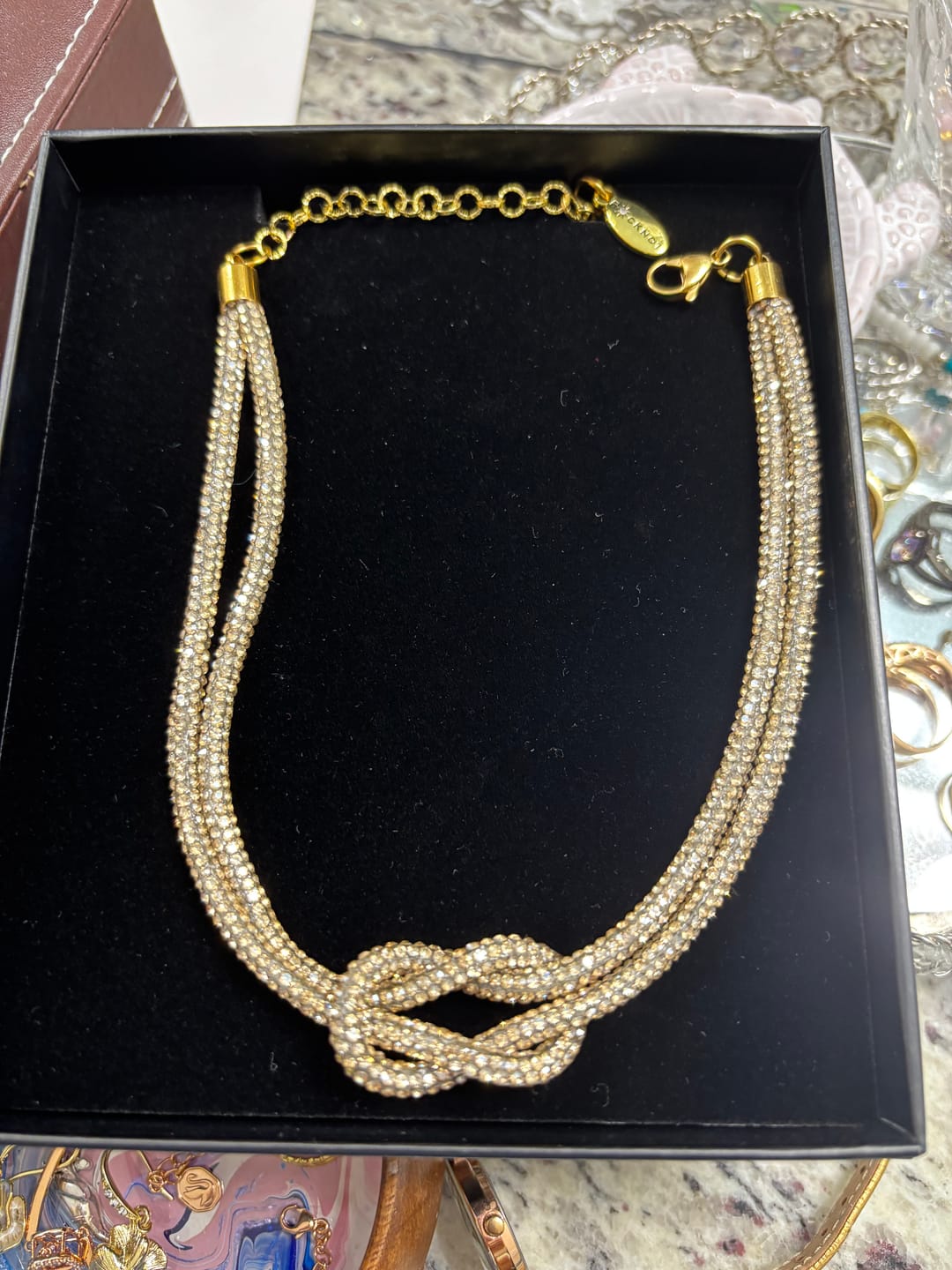 Customer photo review of CRYSTAL KNOT Necklace - Champagne Bubbles
