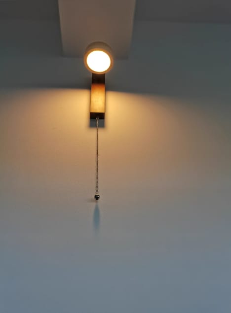 Customer photo review of Wood and Travertine Wall Light, Wall Sconce, Integrated LED