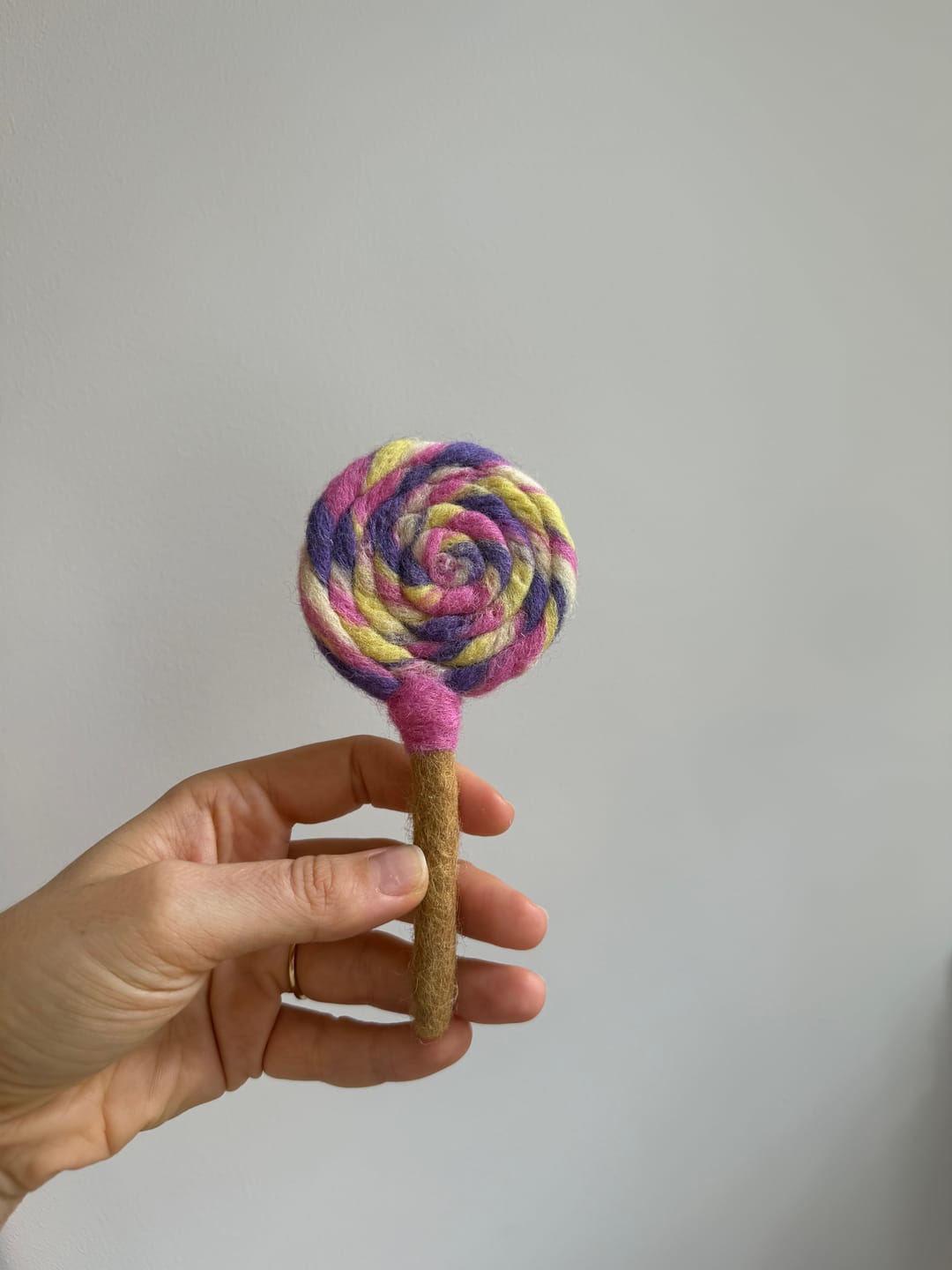 Customer photo review of Felt Colourful Purple, Pink and Yellow Swirls Lollipop