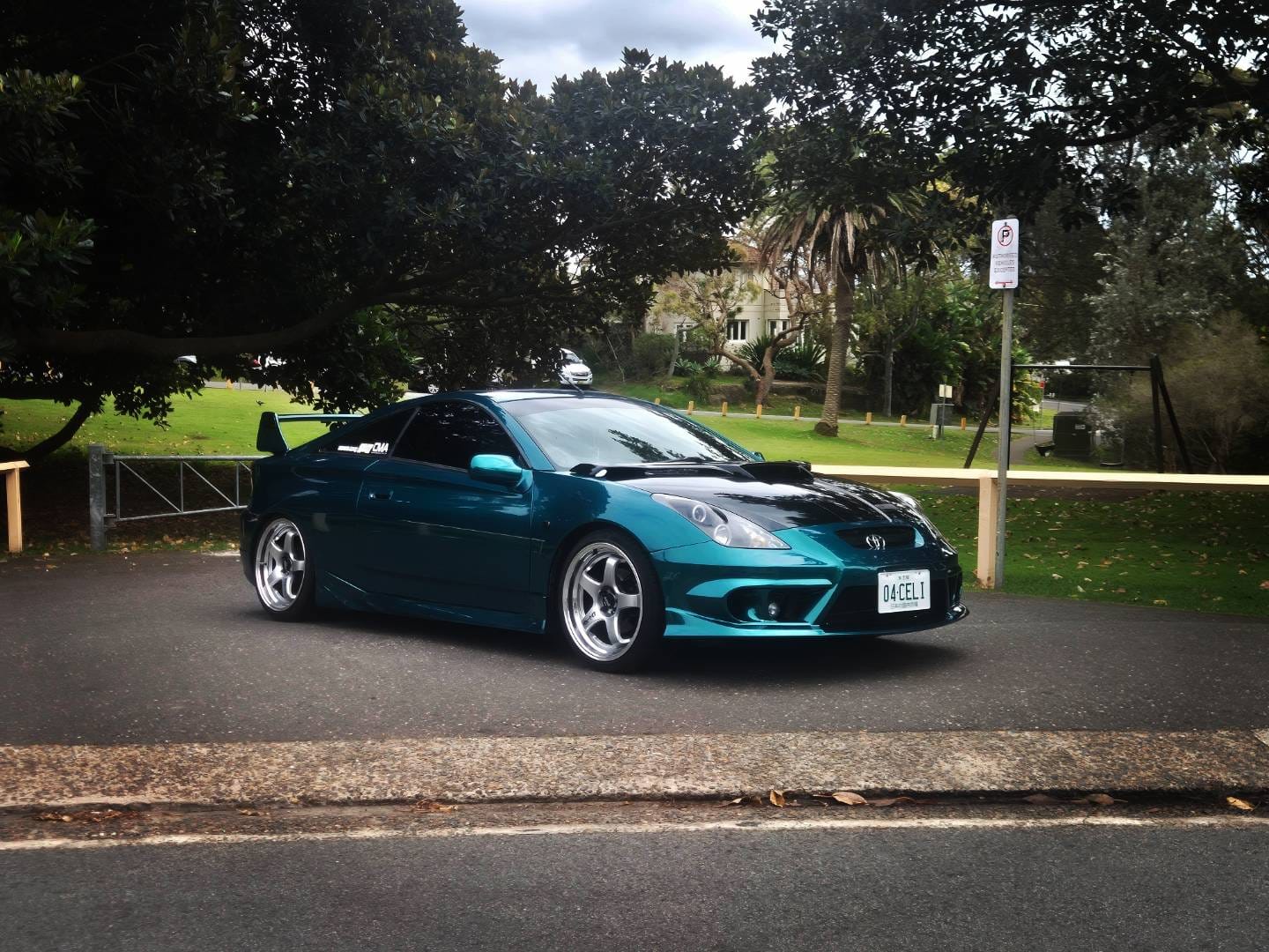 Customer photo review of Glossy Metallic Deep Sea Green Vinyl Wrap