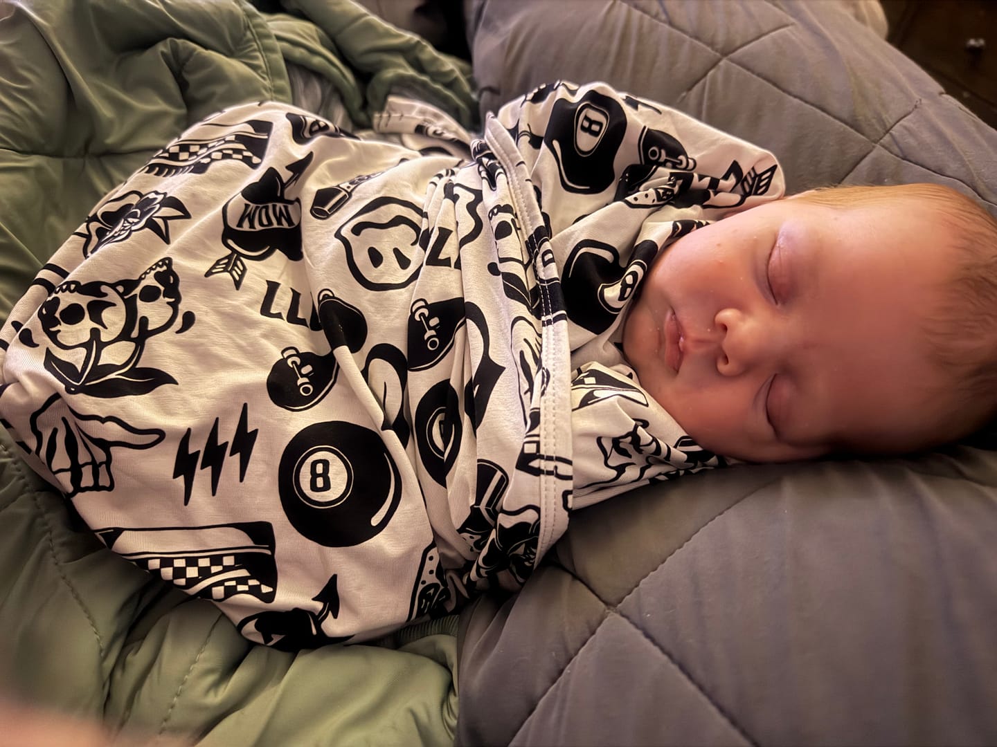 Customer photo review of Bamboo Stretch Swaddle in Cool Kid
