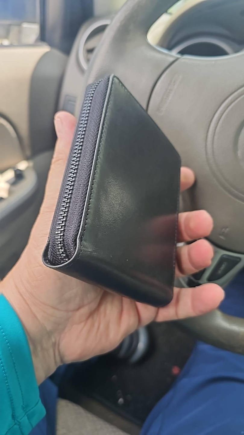 Customer photo review of Zip Around Leather Wallet - Carlos Alperto