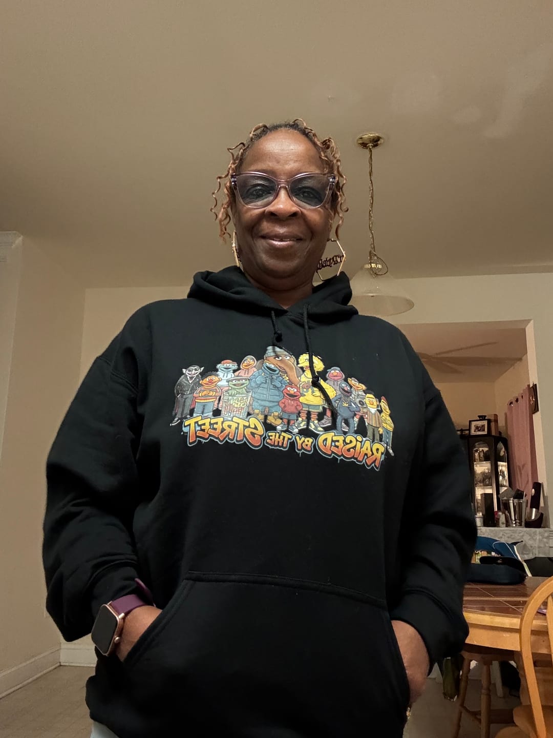 Customer photo review of Raised By The Street Hoodie
