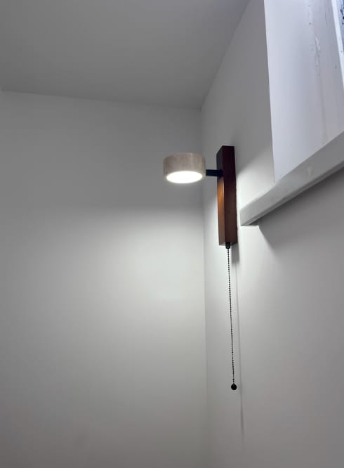 Customer photo review of Wood and Travertine Wall Light, Wall Sconce, Integrated LED